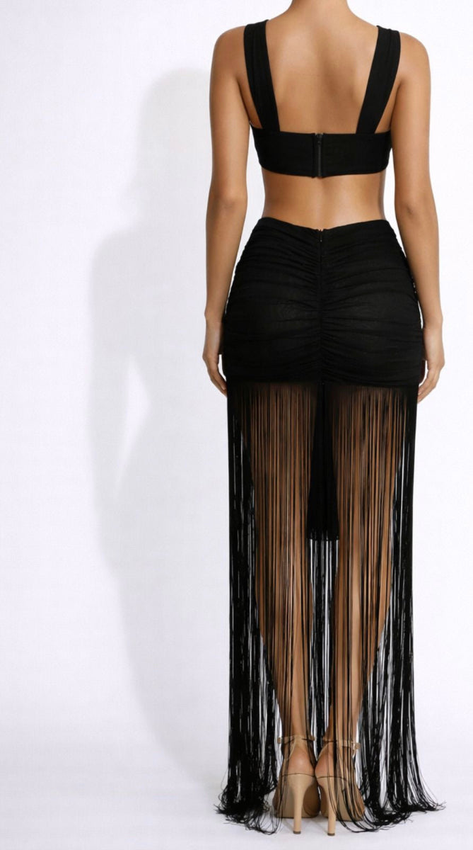 Black outfit  back part with sheer skirt on a white background